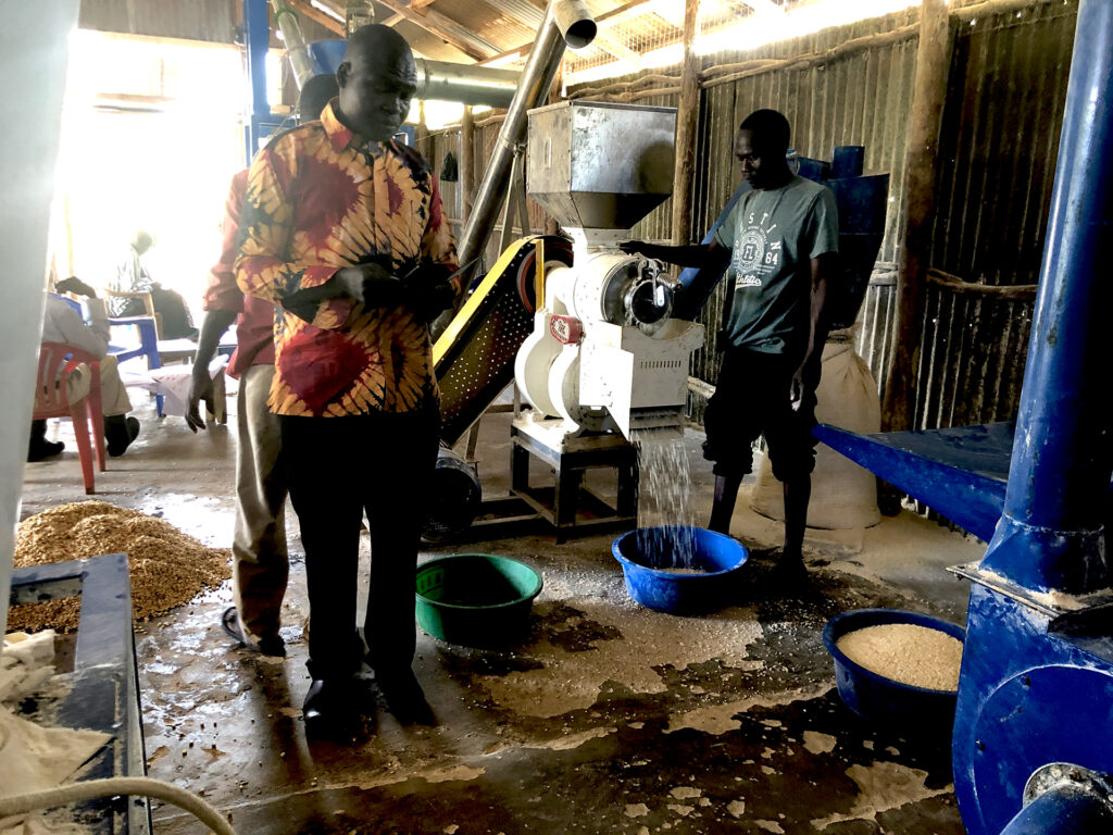 Refugees maize processing machine